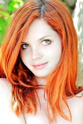 Wonderful 19 years old redhead Sindi B likes trees